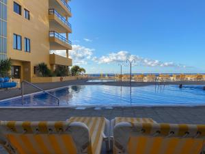 La alberca dentro o cerca de Sea View Aguamarina 36 fotos más