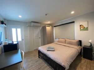 Ένα ή περισσότερα κρεβάτια σε δωμάτιο στο Aree House Poshtel +28 φωτογραφίες