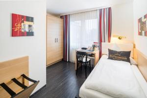 Postel nebo postele na pokoji v ubytování 4-Länder-Hotel Deutschmann