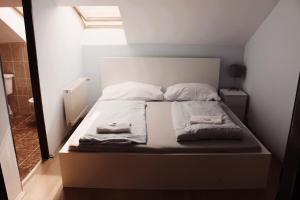 Posteľ alebo postele v izbe v ubytovaní Hotel Amphone