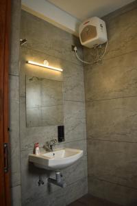 Vannituba majutusasutuses Hotel NT Grand Yercaud