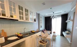 a kitchen with a sink and a counter top at The Blu X Bangsaen F5 R51 in Ban Bang Saen (1)