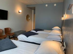 Postel nebo postele na pokoji v ubytování Centrum Hotel Viljandi