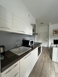 A kitchen or kitchenette at Appartamento Noi Due