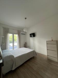A bed or beds in a room at Appartamento Noi Due