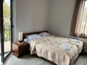 Guest House PIROSMANI客房内的一张或多张床位