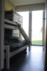 Un pat sau paturi într-o cameră la Apartment Ostend Dune