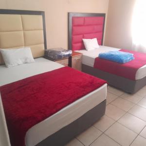 Ένα ή περισσότερα κρεβάτια σε δωμάτιο στο Cozy guesthouse springs