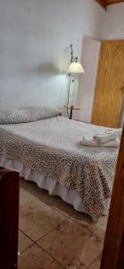 Ένα ή περισσότερα κρεβάτια σε δωμάτιο στο Antonia