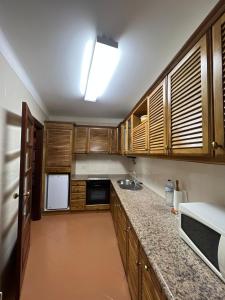 Dapur atau dapur kecil di Apartamento T2 / Condomínio Fechado