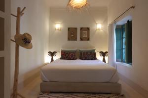 Postel nebo postele na pokoji v ubytování Riad NaaNaa Bed & Breakfast
