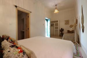 Postel nebo postele na pokoji v ubytování Riad NaaNaa Bed & Breakfast
