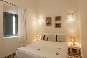 Postel nebo postele na pokoji v ubytování Riad NaaNaa Bed & Breakfast