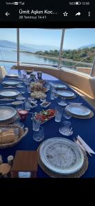 a table with plates of food on a cruise ship at Bluemarmarisgulettour in Marmaris