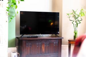 TV o dispositivi per l'intrattenimento presso The Regency Studio at 82 Cathedral