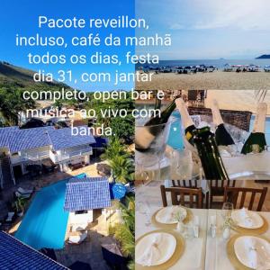 einen Tisch am Strand mit einer Flasche Wein in der Unterkunft Paúba Beach Hotel in Pauba