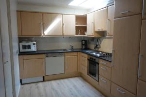 Η κουζίνα ή μικρή κουζίνα στο Vakantiewoning NOORDERSTEK