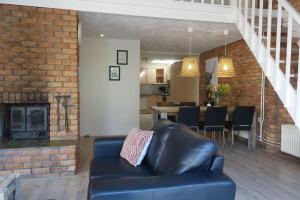 Χώρος καθιστικού στο Vakantiewoning NOORDERSTEK