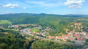 an aerial view of a town with a bridge over a river at Apartament Góry Bardzkie in Bardo