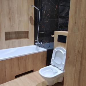 Kúpeľňa v ubytovaní Apartament Perła Kutna