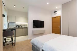 Køkken eller tekøkken på Olive Apartments