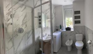 Kúpeľňa v ubytovaní Apartamenty Konopnicka