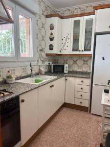 Kuchyňa alebo kuchynka v ubytovaní Villa Barby