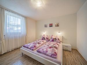 Postel nebo postele na pokoji v ubytování Kapeller