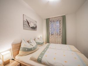 Postel nebo postele na pokoji v ubytování Kapeller