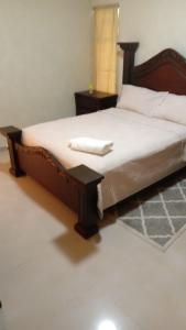 מיטה או מיטות בחדר ב-Edificio Alendyx