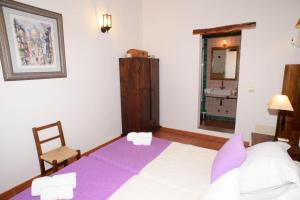 A bed or beds in a room at Can Vich