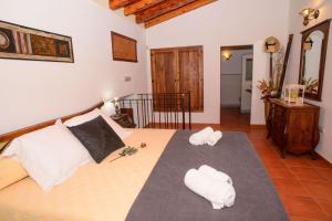 A bed or beds in a room at Can Vich