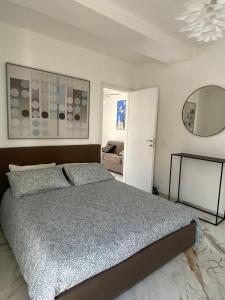 A bed or beds in a room at Beach apartments Isola d'Elba