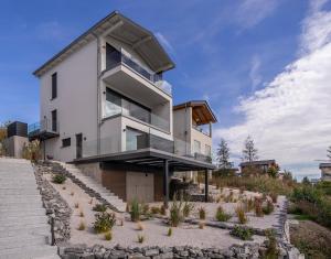a house on top of a hill with stairs at KANANI am Hainer See in Neukieritzsch