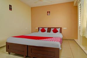 Letto o letti in una camera di Super Hotel O Indra Suites