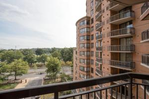 a view from the balcony of a apartment building at Stylish and charming Apartment in Pentagon City in Arlington