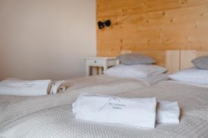 Posteľ alebo postele v izbe v ubytovaní Apartamenty Przystanek Grapa