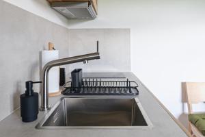 Kuchyňa alebo kuchynka v ubytovaní Apartamenty Przystanek Grapa