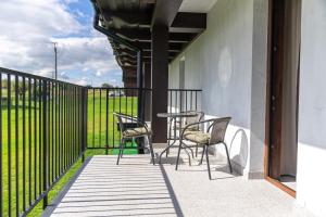 Balkón alebo terasa v ubytovaní Apartamenty Przystanek Grapa