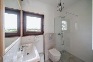 Kúpeľňa v ubytovaní Apartamenty Przystanek Grapa