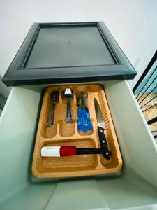 a tray of utensils on a cutting board at El Paso in David