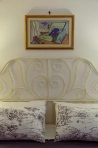 Een bed of bedden in een kamer bij B&B Massico Apartments