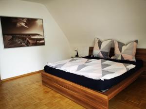 Postel nebo postele na pokoji v ubytování Charmantes Ferienhaus Casa Ella mit Balkon