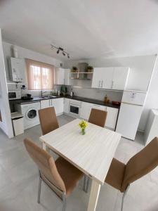 Kuchyňa alebo kuchynka v ubytovaní Casa de Las Palmeras