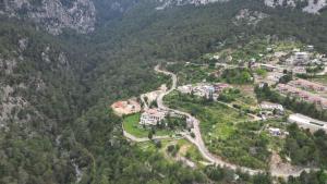 an aerial view of a village in the mountains at Gökdere Evleri in Antalya