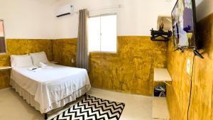 Et tv og/eller underholdning på Flat-Centro Morro de São Paulo-Mare mansa B