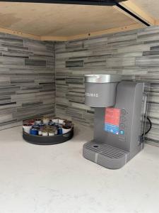 a room with a computer and a wall with a display at The Silver Benz in Atlanta +17 photos