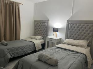 Una cama o camas en una habitación de Complejo Lamadrid - semiprivado