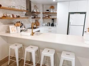 Cucina o angolo cottura di Cosy Home Byron Bay