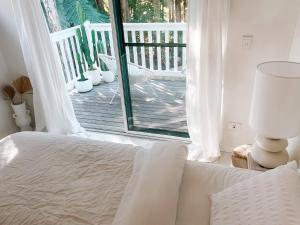 Letto o letti in una camera di Cosy Home Byron Bay